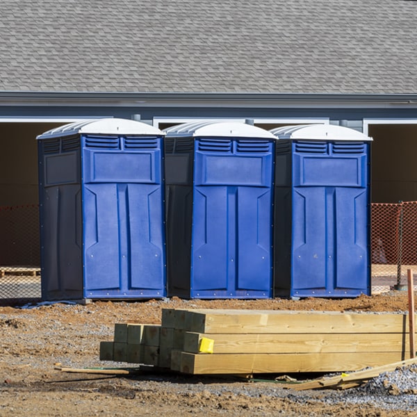 what is the cost difference between standard and deluxe porta potty rentals in Cartwright